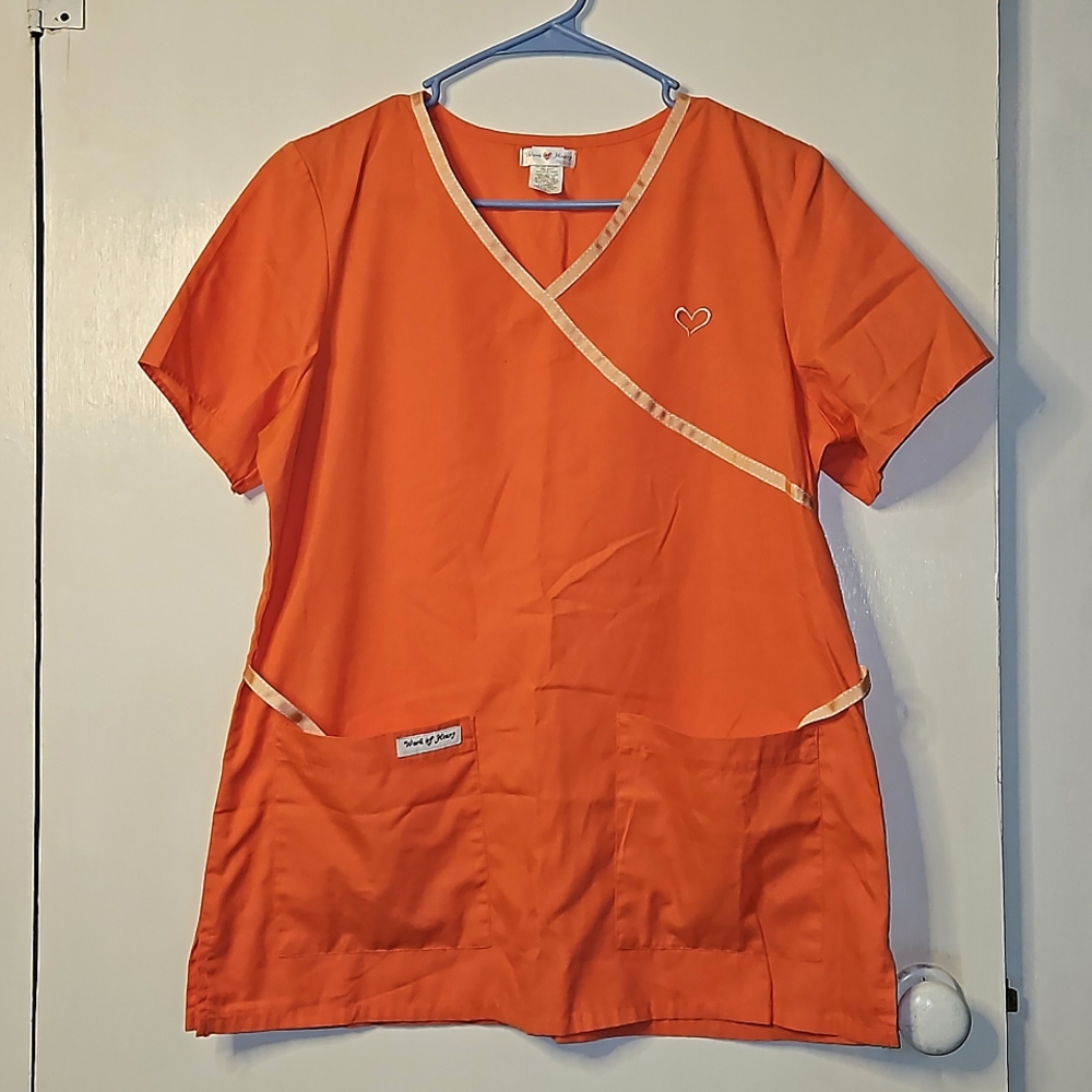 Work of hearts scrub top, size medium. Light orange very pretty